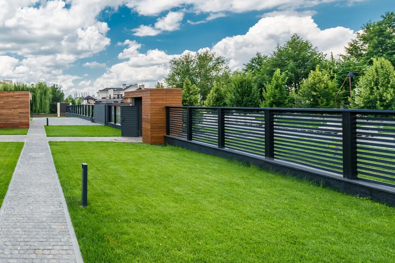 Example of a modern black horizontal slat fence